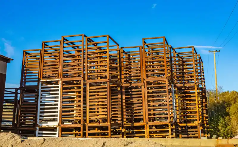 Steel frame for a building going up under a clear sky